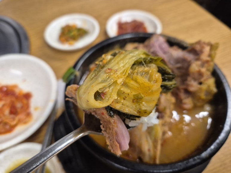 Wilted greens and meat