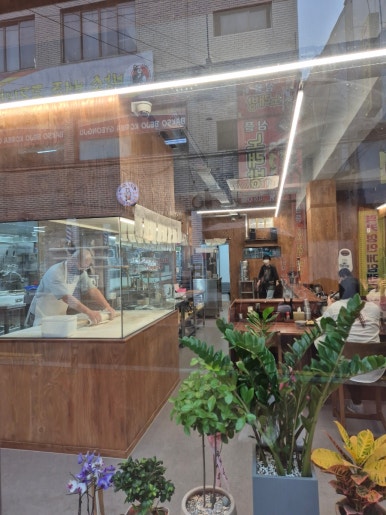 Panneau de la Succursale principale de Jjolmyeon Myeongdong de Park Yongja