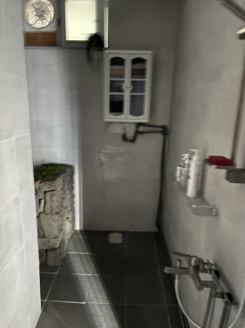 Minsuminsu Guesthouse Waschbecken und Haartrockner