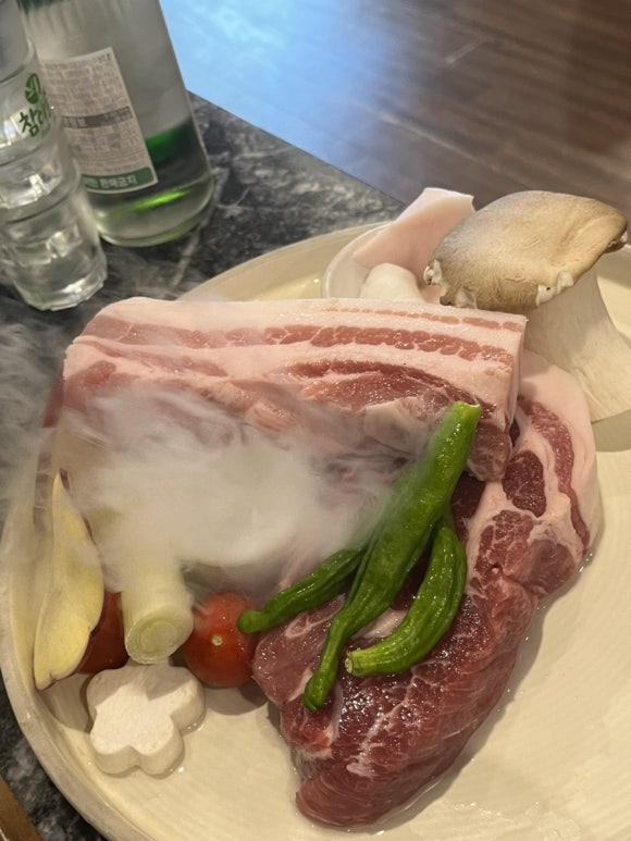 Cooking samgyeopsal at Majangdong Kimchi Suwon Ingye Branch